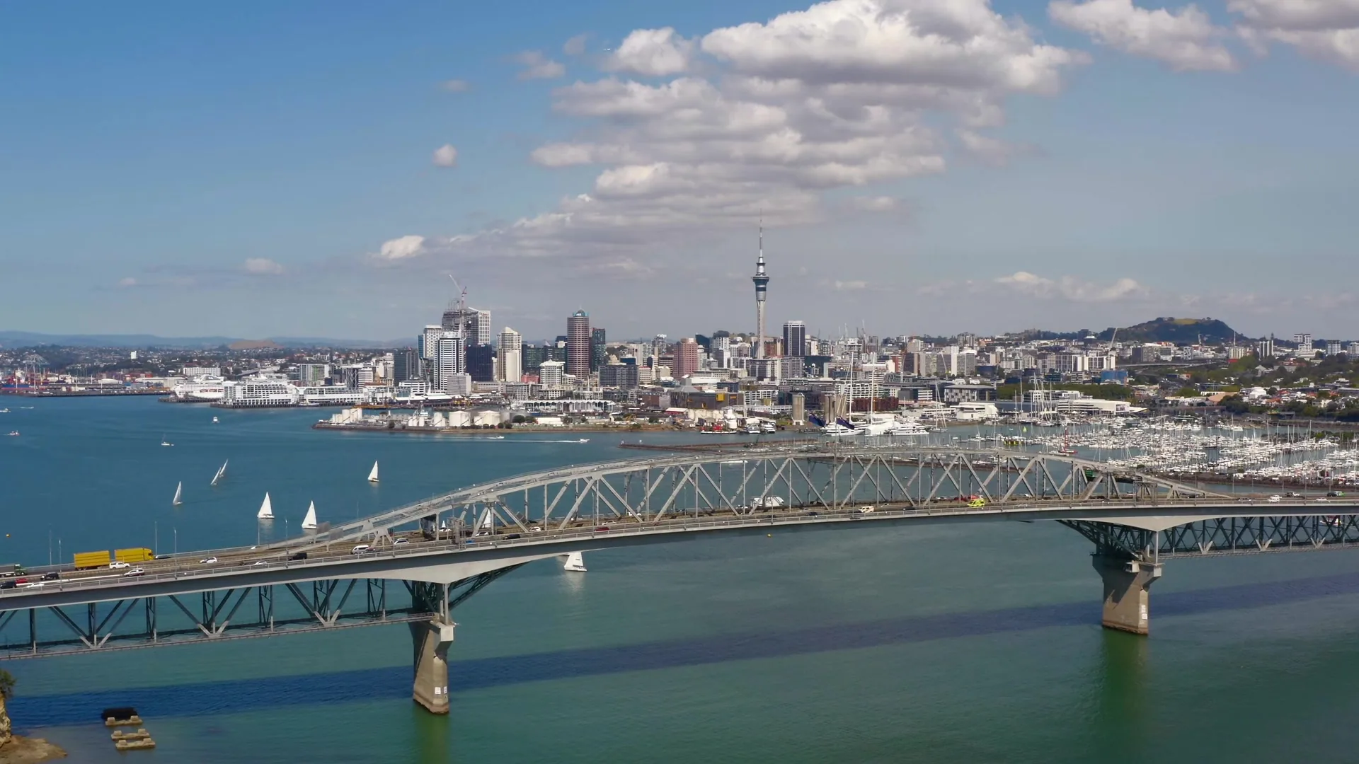 Night view across Auckland CBD and the Waitemata Harbour with city lights