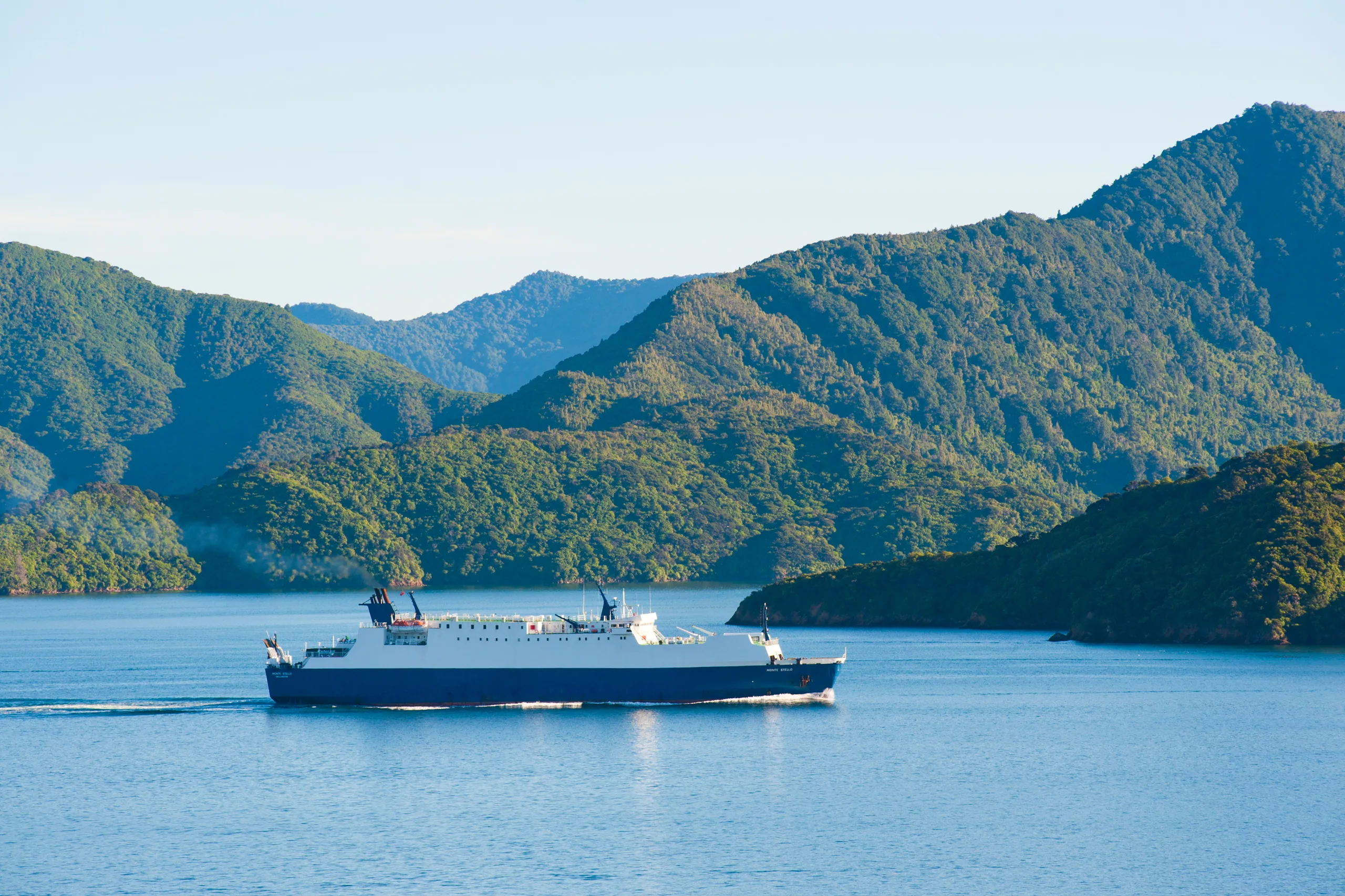 An Interislander ferry winding through the bush-lined waterways of the Marlborough Sounds
