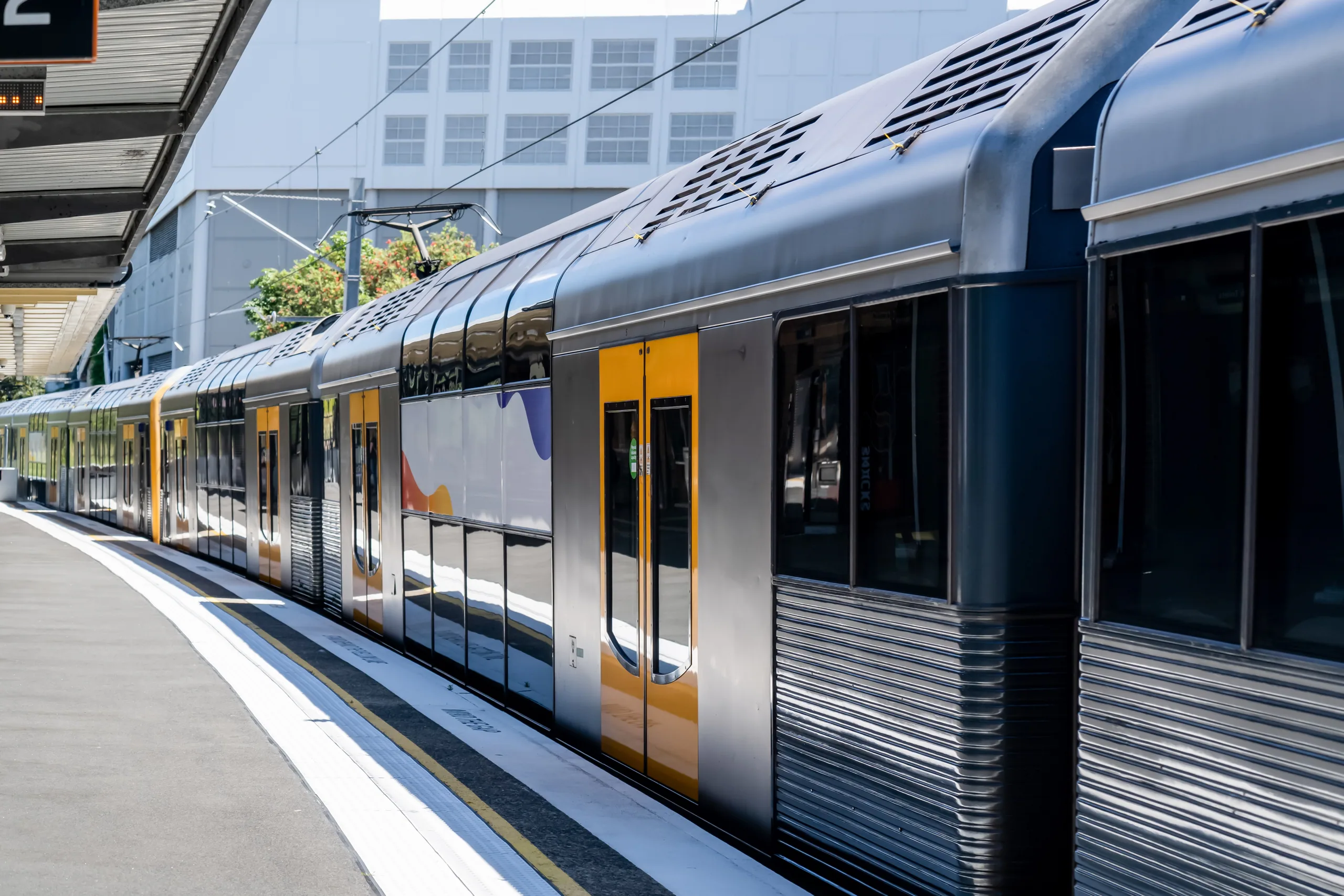 A suburban passenger train at a station platform
